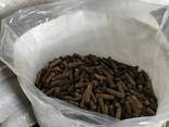 Fuel wood pellets in granules. Пеллеты топливные деревянные в гранулах
