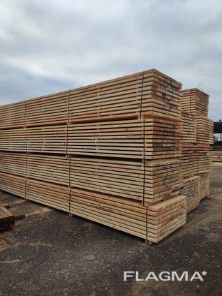 Sawn timber of pine. Delivery by wagons.