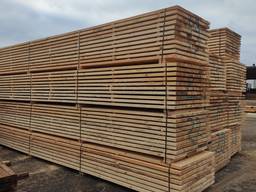 Sawn timber of pine. Delivery by wagons.