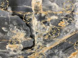 Tiles and slabs made of onyx